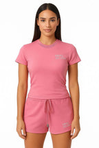 Women's pink crop top and shorts set by MIMOSPLASH, showcasing stylish matching activewear for comfort and flair.