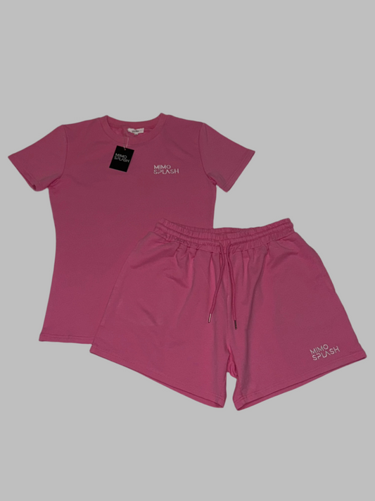 Woman's pink colour fitness slim crop top with shorts.